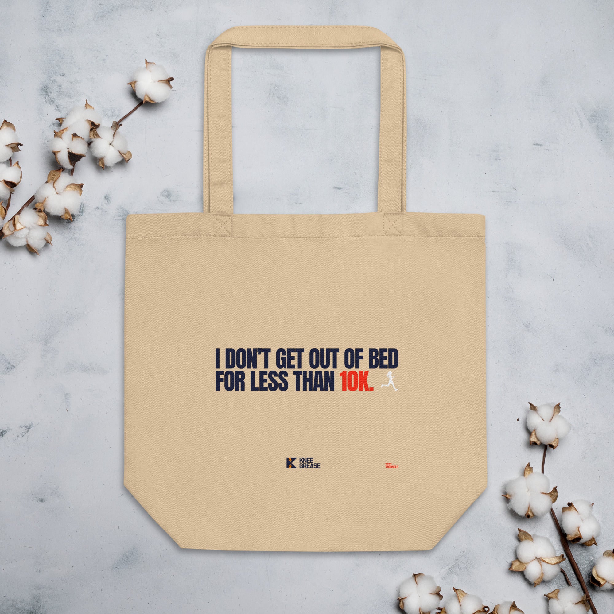 I DON'T GET OUT OF BED FOR LESS THAN 10K (small type) Eco Tote Bag tan
